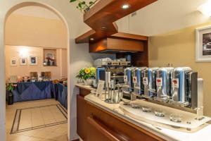 Kuchyň nebo kuchyňský kout v ubytování Hotel Bonifacio