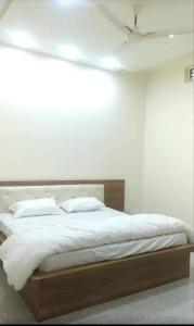 Кровать или кровати в номере Anant Royal