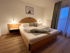 Postel nebo postele na pokoji v ubytování LUSE Living