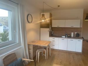 Kuchyň nebo kuchyňský kout v ubytování Apartament Kuba na Spokojnej
