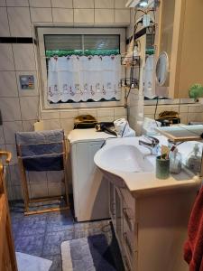 Et opholdsområde på Strandbungalow Wittower Heide 24 + 14 billeder