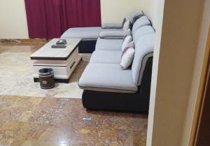 Area soggiorno di Farah Hotel Apartment