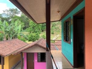 Balkon oz. terasa v nastanitvi Chalés Recanto do Bosque Lumiar