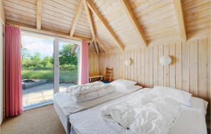 Postel nebo postele na pokoji v ubytování Holiday Home Tulipanvej Fjerritslev I