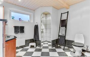 a bathroom with a shower and a toilet at Søglimt in Hejls +21 photos