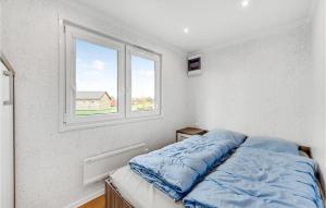 Postel nebo postele na pokoji v ubytování 2 Bedroom Nice Home In Ulfborg
