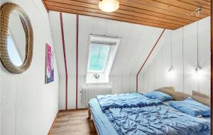 Postel nebo postele na pokoji v ubytování Rishøj