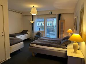 Postel nebo postele na pokoji v ubytování Björnlokan B&B