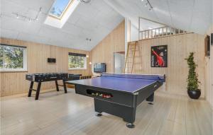 a ping pong room with a pool table at Lovely Home In Sydals With Sauna in Høruphav