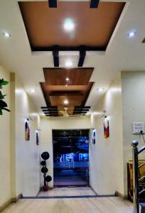 a hallway in a building with a vaulted ceiling at Regal Hotel in Ajmer