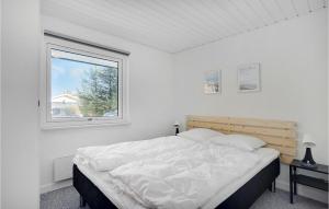 Postel nebo postele na pokoji v ubytování Holiday Home Søndertoften Blåvand I
