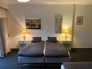Postel nebo postele na pokoji v ubytování Björnlokan B&B