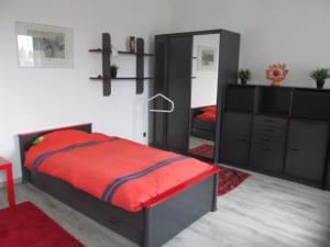 Postel nebo postele na pokoji v ubytování B&B Middelheim