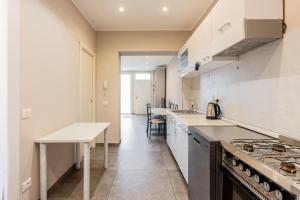 Kuchyň nebo kuchyňský kout v ubytování Via Mazzini a Viareggio
