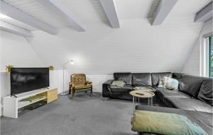 Posezení v ubytování Cozy Home In ster Assels With Sauna