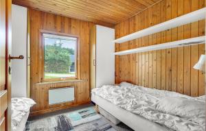 Postelja oz. postelje v sobi nastanitve Holiday Home Bindslev 10