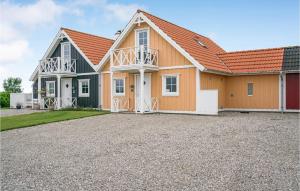 a large house with a driveway in front of it at Gorgeous Home In Brenderup Fyn in Bro +23 photos