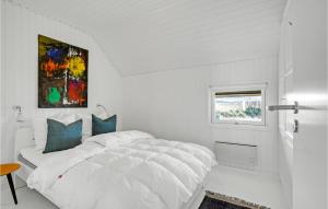 Postel nebo postele na pokoji v ubytování Holiday Home Sydslugen Blåvand Ii