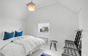 Postel nebo postele na pokoji v ubytování Holiday Home Sydslugen Blåvand Ii