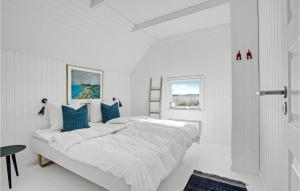 Postel nebo postele na pokoji v ubytování Holiday Home Sydslugen Blåvand Ii