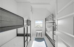 Postel nebo postele na pokoji v ubytování Holiday Home Sydslugen Blåvand Ii