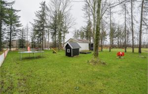 a park with a ping pong table and a tree at 2 Bedroom Stunning Apartment In Billund in Billund