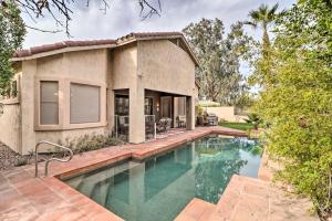 a home with a swimming pool in front of a house at Phoenix Home with Private Pool about 8 Mi to Dtwn in Phoenix