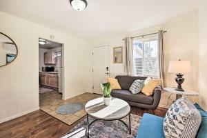 a living room with a couch and a table at Quiet Carpinteria Cottage By Town and Beaches in Carpinteria