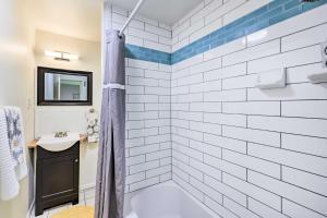 a bathroom with a shower and a sink at Quiet Carpinteria Cottage By Town and Beaches in Carpinteria +19 photos