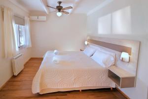 Una cama o camas en una habitación de La Olla Complejo Turistico