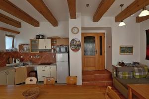 Kuchyň nebo kuchyňský kout v ubytování Miniresort AMULET