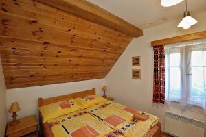Postel nebo postele na pokoji v ubytování Miniresort AMULET