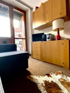 Kuchyň nebo kuchyňský kout v ubytování Sestriere Borgata appartamento in montagna Casa di Bertu + 15 fotografií