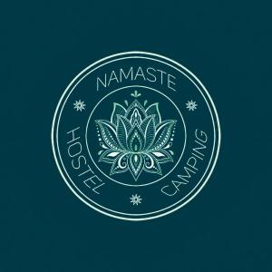 a label with a lotus flower on a green background at Namaste Hostel & Camping in Bar