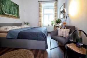 Postel nebo postele na pokoji v ubytování Apartmány U Aloise