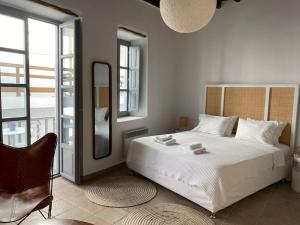 Posteľ alebo postele v izbe v ubytovaní Venghera Naousa Apartment in the heart of Naousa