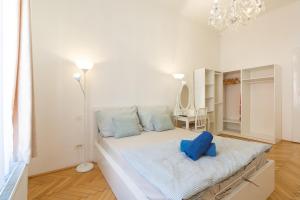 Posteľ alebo postele v izbe v ubytovaní Garys bright and spacious two bedroom flat near Danube