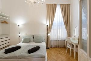 Posteľ alebo postele v izbe v ubytovaní Garys bright and spacious two bedroom flat near Danube