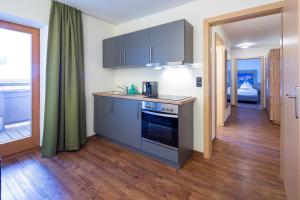 Kuchyň nebo kuchyňský kout v ubytování Ferienhotel Fuchs