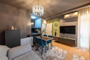 TV a/nebo společenská místnost v ubytování BANE APARTMANI 5