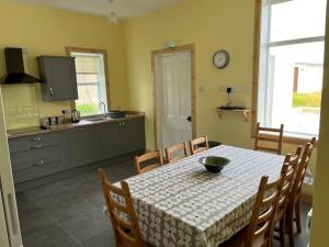 a kitchen with a table with a bowl on it at Bixter House - a spacious self-catering property 