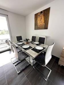 Posedenie v ubytovaní Superbe appartement proche de Strasbourg