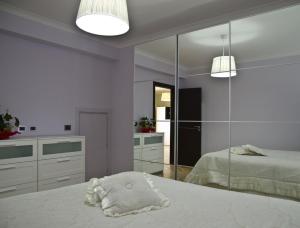 En eller flere senge i et værelse på Casa Vacanza Cicirello