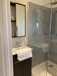 a bathroom with a sink and a shower at Clara Lodge in Sallins