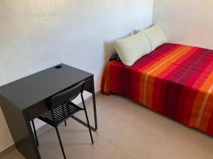 Katil atau katil-katil dalam bilik di Location de Chambres, Séjour près des Grands Buffets Narbonne