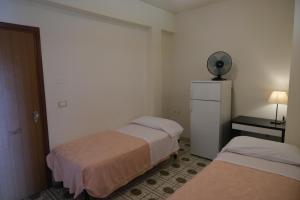 Postel nebo postele na pokoji v ubytování Aparthotel Amelia Dream View