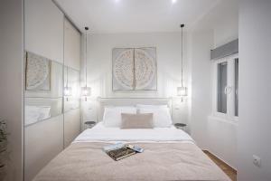Posteľ alebo postele v izbe v ubytovaní Davina The City Central Suite