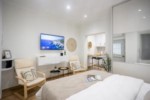 Posteľ alebo postele v izbe v ubytovaní Davina The City Central Suite