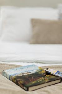 Posteľ alebo postele v izbe v ubytovaní Davina The City Central Suite