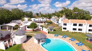 an aerial view of a resort with a swimming pool at OceanBlue Resort in Christ Church